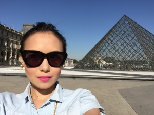 Bright pink lips to match the bight weather outside the Louvre Museum in Paris. 